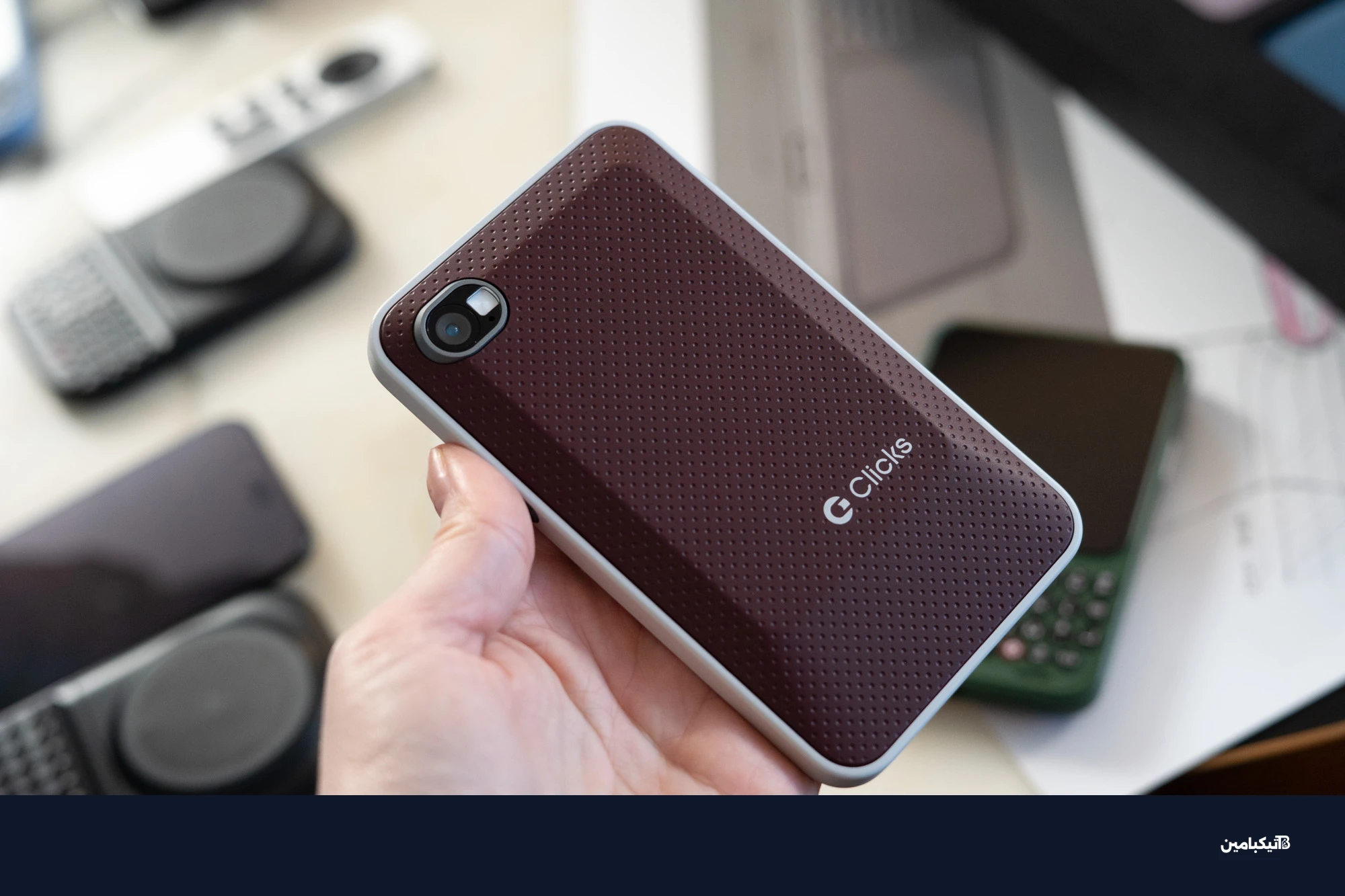 Clicks Communicator with dark red back panel